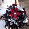 Black, silver and red ornate paper bridal bouquet with shimmering patterned paper and feathers